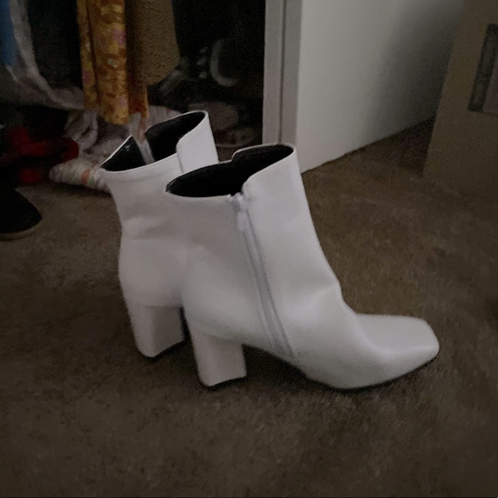 White leather go-go booties. Never worn.